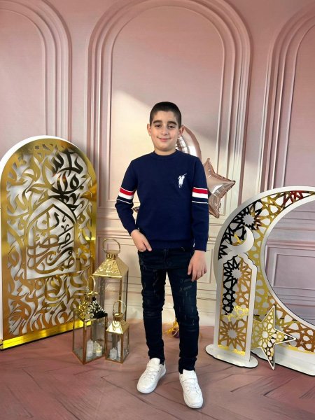 كنزة الكحلي الأنيقة للأولاد