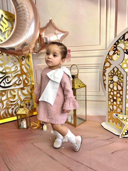 فستان بيبي وردي ناعم بفيونكة جانبية – Pink Elegant Baby Dress